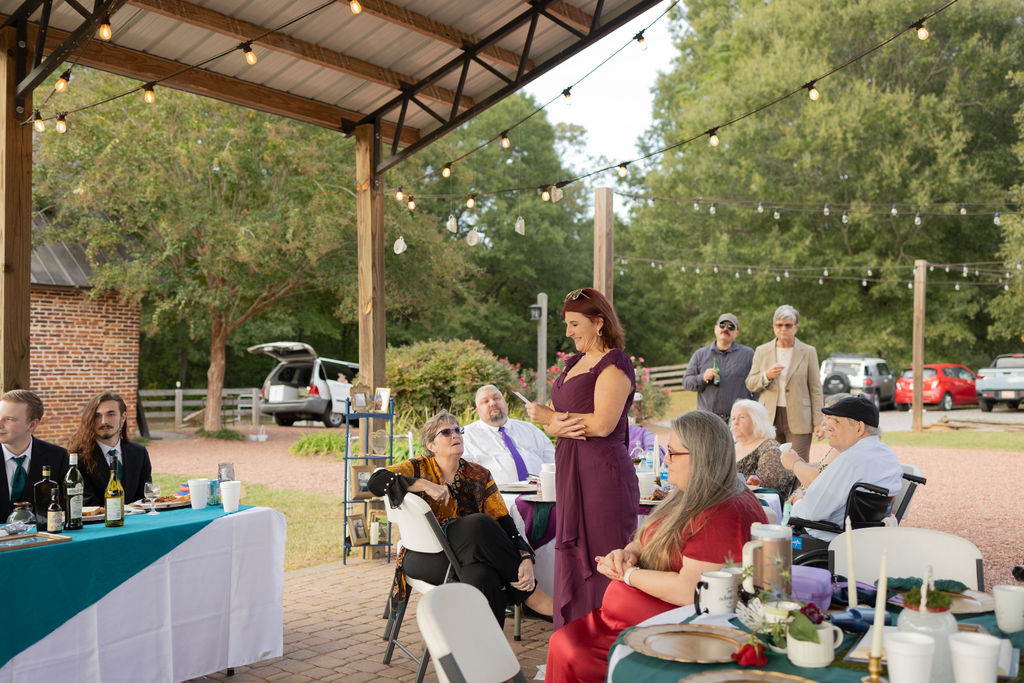 mother of the bride giving toast at wedding reception at The Whiskey Bonding Farm by Amanda Richardson Photography