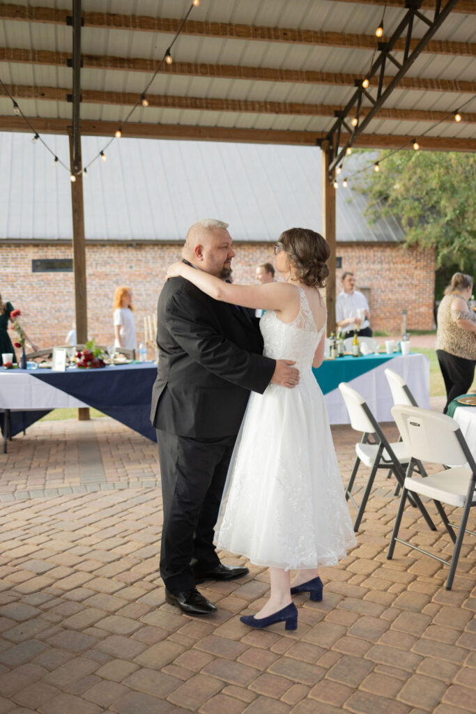 father and daughter dance at the whiskey bonding farm by amanda richardson Photography