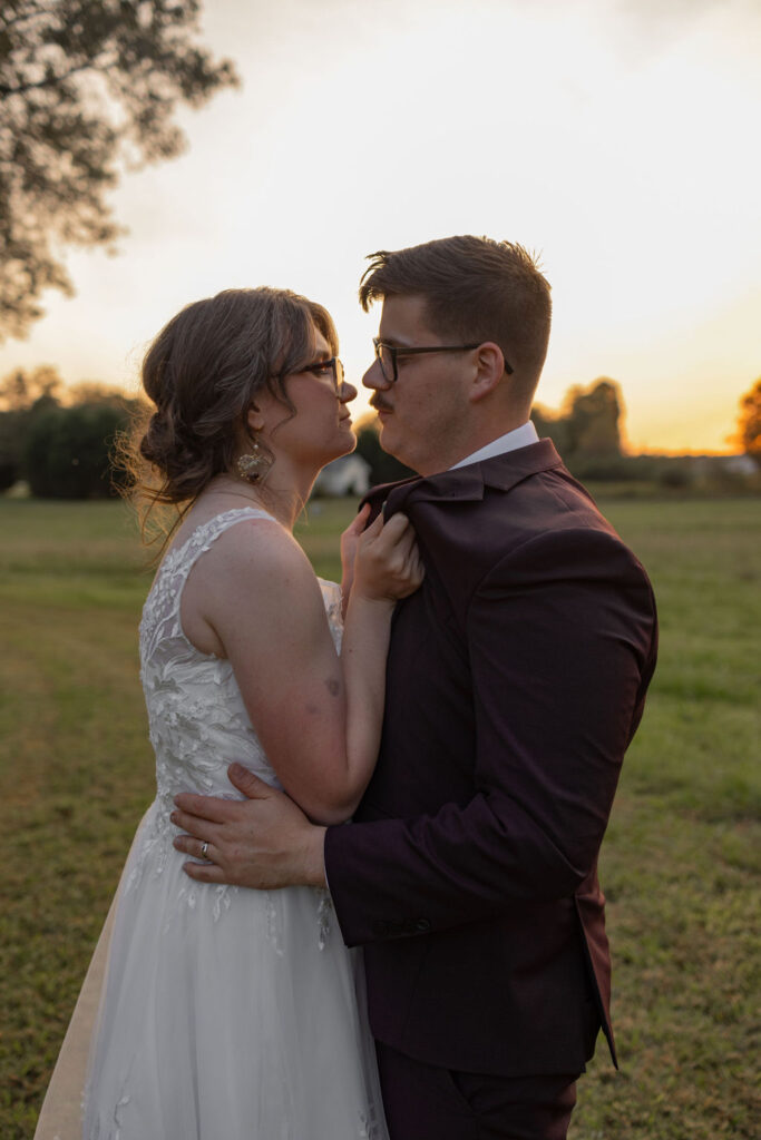 bride and groom sunset portraits by Amanda Richardson Photography