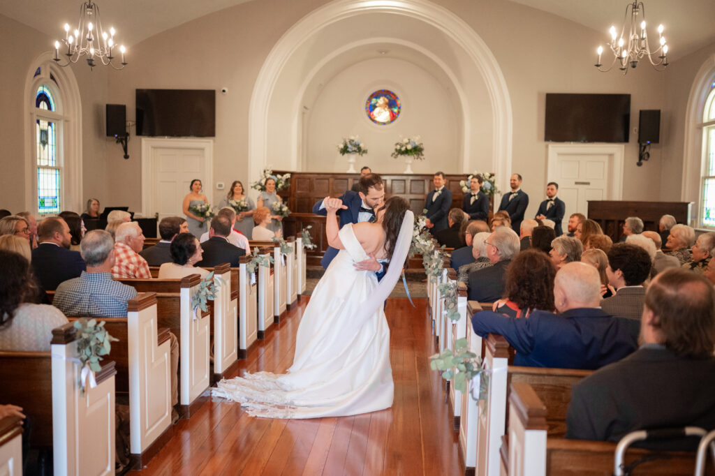wedding guests celebrating bride and groom at church in Midland Georgia by Amanda Richardson Photography